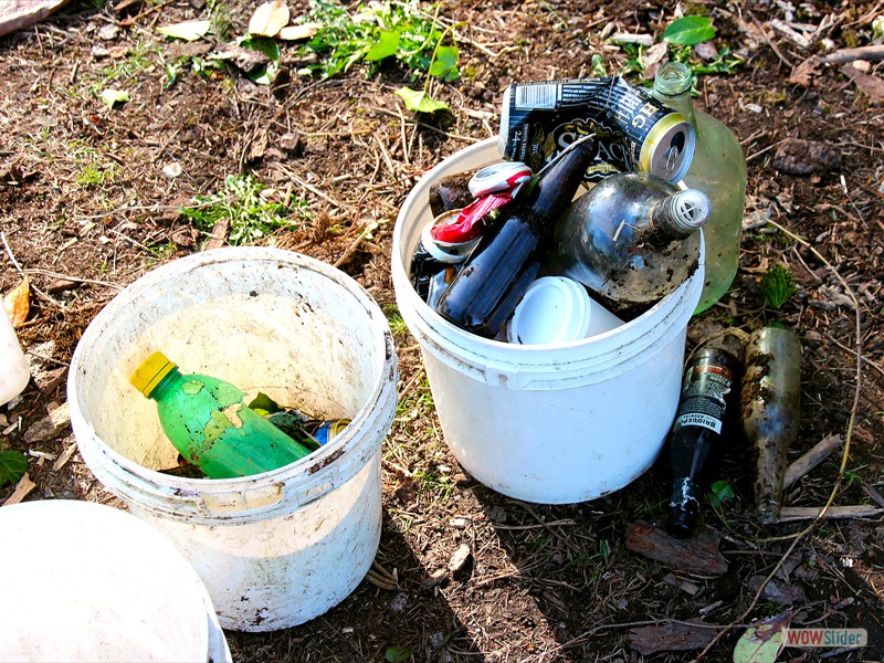 Buckets of garbage that was found and removed from the work party site.