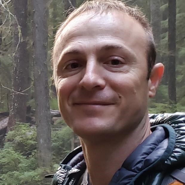 Headshot of Daniel Donato in the forest