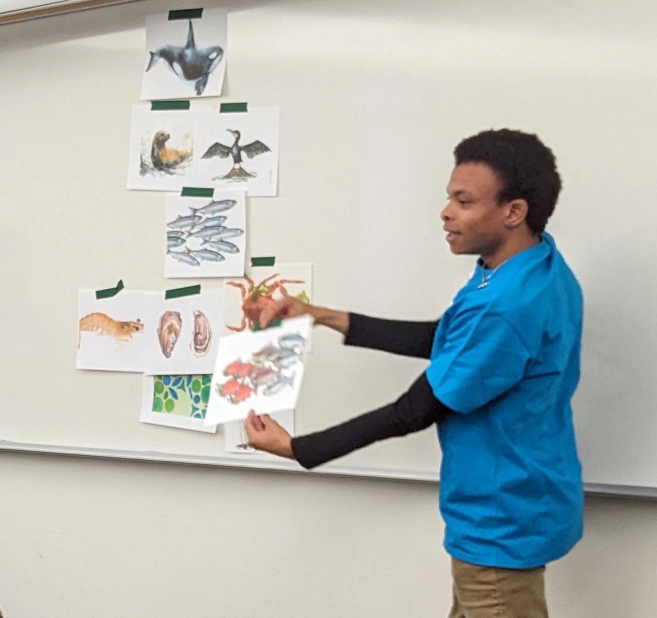 An Environmental Sciences student leads an exercise for 5th graders during Compass to Campus events on October 24.